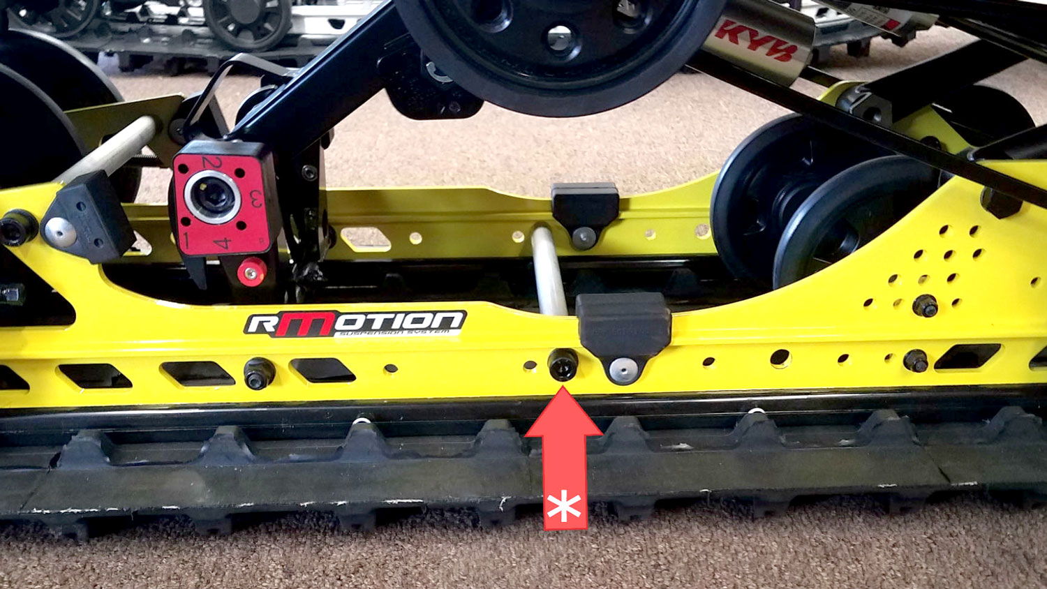 Snowmobile Shocks | rmotion suspension shock yellow